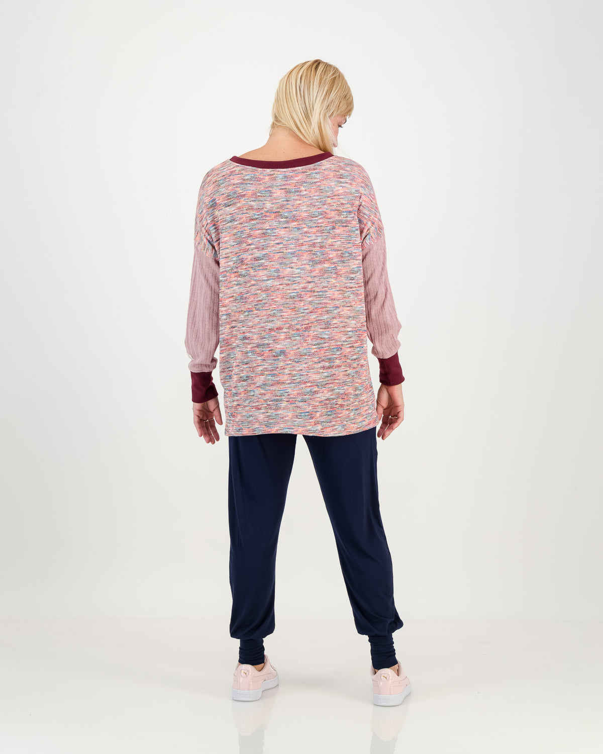 back view of Carefree casual lavender Jersey, boxy shape with longer back, paired with navy comfy pants
